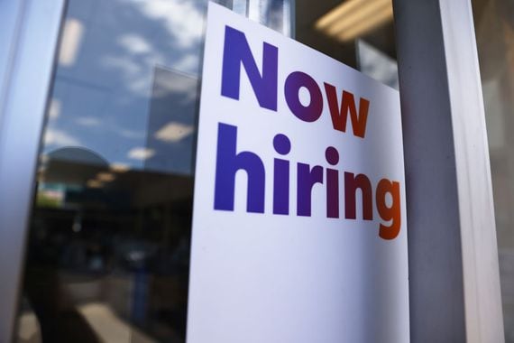 LOS ANGELES, CALIFORNIA - JUNE 23: A 'Now hiring' sign is displayed at a FedEx location on June 23, 2021 in Los Angeles, California. Nearly 650,000 retail workers gave notice in April, the biggest one-month worker exodus in the retail industry in more than 20 years, amid a strengthening job market.  (Photo by Mario Tama/Getty Images)