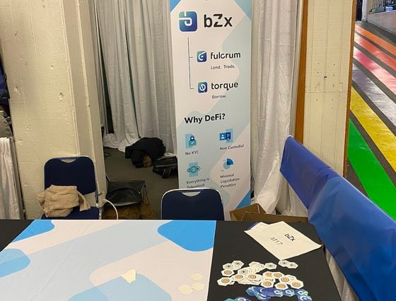 AFTER THE HACK: DeFi protocol bZx's booth sits empty at ETHDenver. 