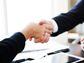 CDCROP: Business and office concept - businessman shaking hands each other. Human resources management and recruitment (Getty Images)