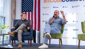 Parker Lewis, left, interviewing former Riot Blockchain Chief Commercial Officer Chad Harris at Bitcoin Commons in May 2023.
