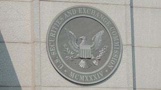 Photo of the SEC logo on a building wall