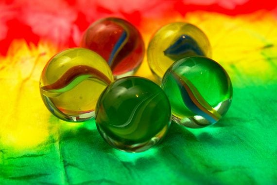 red, yellow and green marbles