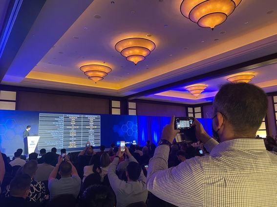 Phones flashed across the room as eager miners snapped photos of Anatalpha's presenetation at Bitmain's World Digital Mining Summit in Miami, Florida. (Eliza Gkritsi/CoinDesk)