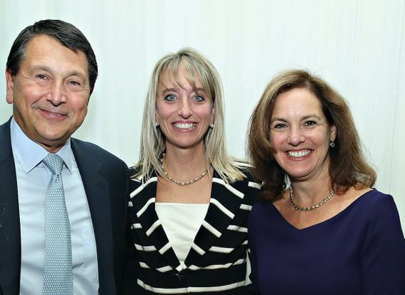 Sandie O'Connor (center), now a board member of Ripple, at a YMCA benefit in 2015.
