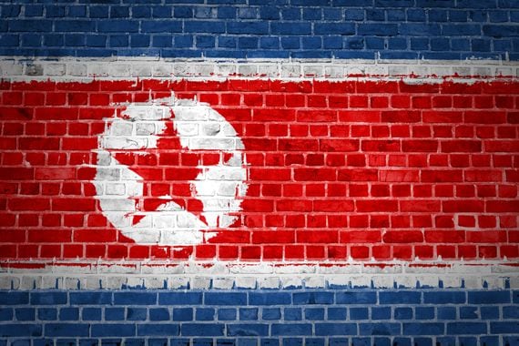 North Korea's flag painted on a wall (Shutterstock)