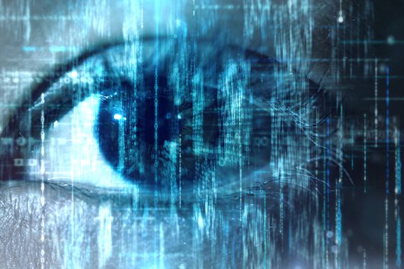 Woman eye taking in digital binary data