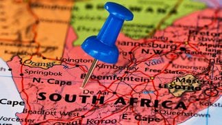 South Africa on a map with a pushpin thumbtack (Shutterstock)