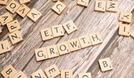 Scrabble tiles spelling out "ETF GROWTH"