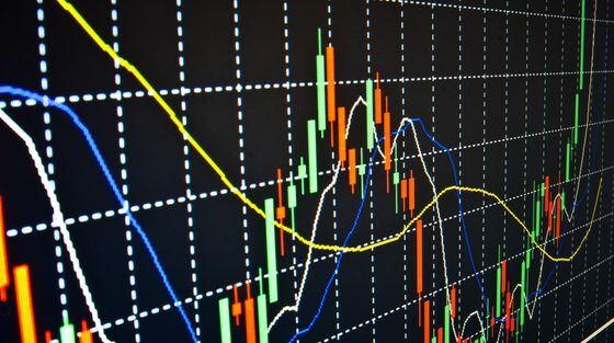 Financial data graph at stock exchange via Shutterstock