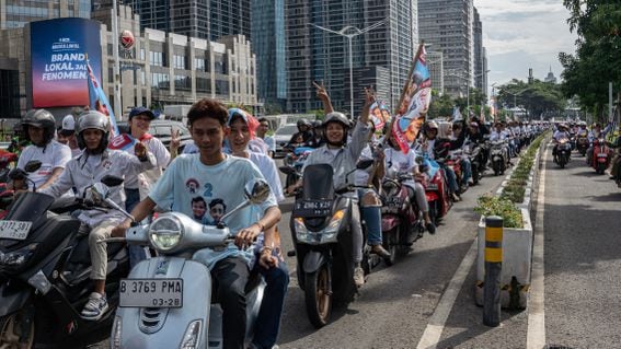 Prabowo and Gibran supporters during Indonesia presidential elections on Feb.14 in Jakarta. (Photo by Oscar Siagian/Getty Images)