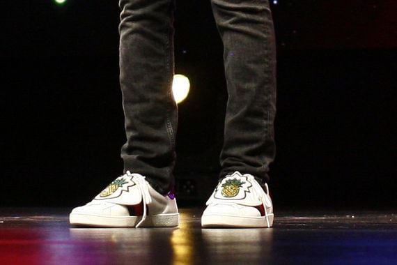 STAND BACK: Justin Sun's Gucci sneakers on stage at the first NiTron Summit in San Francisco, January 2019. (Photo by Brady Dale for CoinDesk)