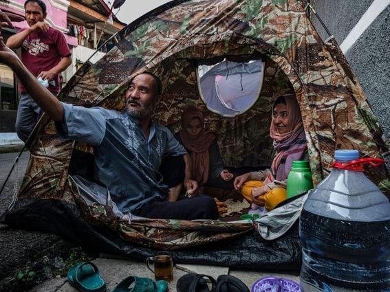 Afghan refugees in Indonesia. Banking bans and a lack of cryptocurrency infrastructure will add major barriers to Afghans trying to send money home. (Getty Images)