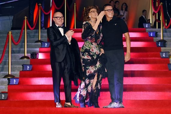 Fashion designer Stefano Gabbana, actress Sofia Loren and fashion designer Domenico Dolce attend a Dolce & Gabbana fashion show in 2018.