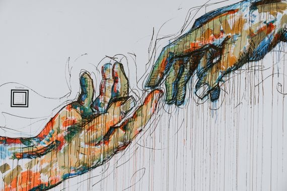 a drawing of two human hands touching