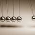 Silver balls on strings in a Newton's cradle