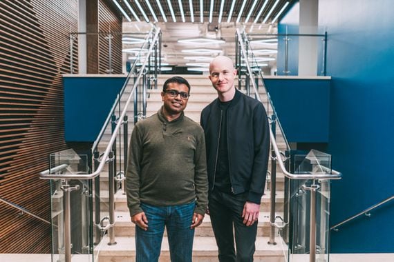 Coinbase Chief Product Officer Surojit Chatterjee (left) poses with CEO Brian Armstrong. (Courtesy photo)