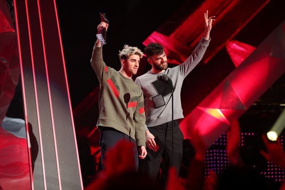 INGLEWOOD, CA - MARCH 11:  Andrew Taggart (L) and Alex Pall of The Chainsmokers accept Best Collaboration for 'Something Just Like This' onstage during the 2018 iHeartRadio Music Awards which broadcasted live on TBS, TNT, and truTV at The Forum on March 11, 2018 in Inglewood, California.  (Photo by Christopher Polk/Getty Images for iHeartMedia)