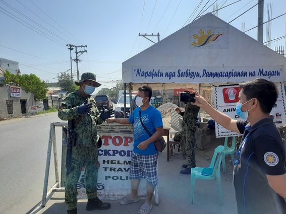 A checkpoint in Tuguegarao City, the Philippines. Via the Philippine Information Agency