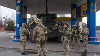 Ukrainian servicemen make a stop on the road on March 5, 2022 in Sytniaky, Ukraine (Anastasia Vlasova/Getty Images)