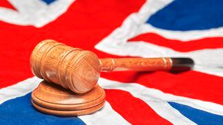 Union Jack Flag With Gavel (Peter Dazeley/Getty Images)
