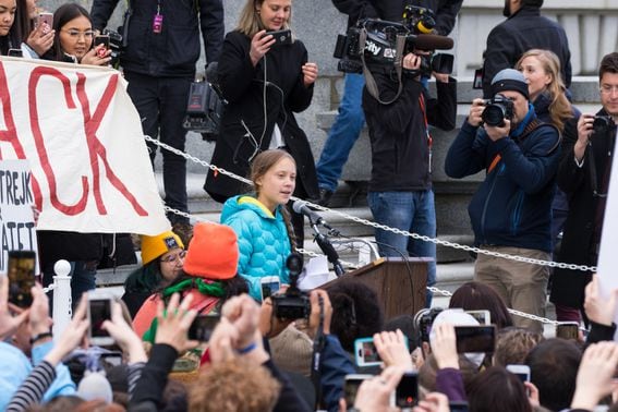 ESG: Swedish climate activist Greta Thunberg speaks to a crowd at a rally in Edmonton, Canada. (Credit: Shutterstock)