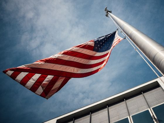 CDCROP: American Flag on flagpole (Jonathan Simcoe/Unsplash)