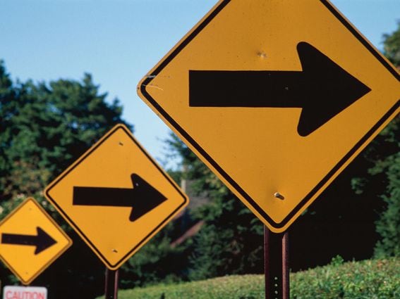 CDCROP: Three Arrows Road signs caution (The Image Bank RF/Getty Images)