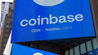 NEW YORK, NY - APRIL 14: Monitors display Coinbase signage during the company's initial public offering (IPO) at the Nasdaq market site April 14, 2021 in New York City. Coinbase Global Inc. is the largest U.S. cryptocurrency exchange, debuting today through a rare direct listing.  (Photo by Robert Nickelsberg/Getty Images)