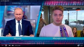 Vladimir Putin is answering the question about cryptocurrencies on the Russian TV
