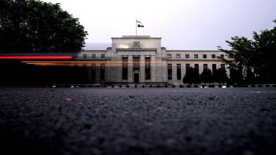 Fed Holds Rates at Near Zero, Projects Two Possible Rate Hikes by Late 2023