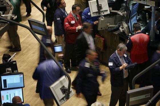 Traders work on the floor of the New York Stock Exchange. (Shutterstock)