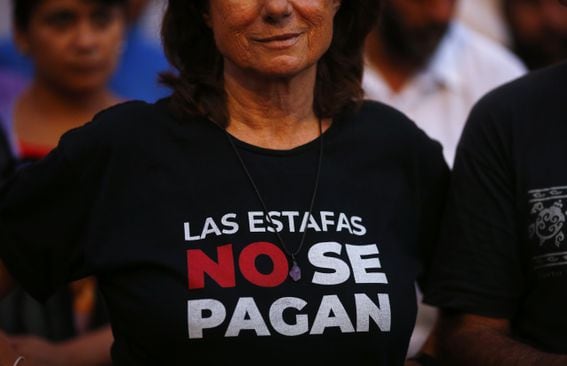 A demonstrator during a protest against Argentina's International Monetary Fund (IMF) agreement outside the National Congress building in Buenos Aires on Thursday, March 17, 2022. The protestor's t-shirt features the slogan "Las Estafas No Se Pagan," or "Scams are not meant to be paid."


Argentina's inflation accelerated in February at its fastest pace in nearly a year, surpassing forecasts and challenging the governments targets for this year in its preliminary agreement with the International Monetary Fund. (Marcos Brindicci/Bloomberg via Getty Images)