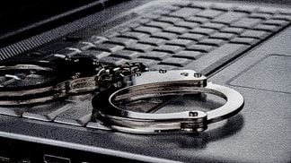 crypto scandals 2014 laptop handcuffs