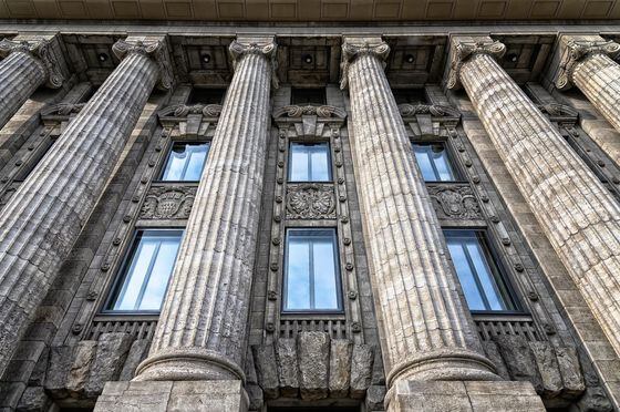 stone columns in front of a building