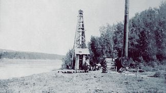 An early oil derrick in Alberta, Canada, 1898. (Wikipedia, modified by CoinDesk)