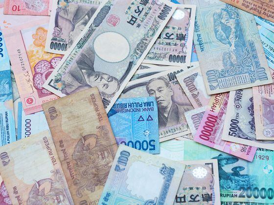 CDCROP: Asian currency money cash dollar bills (Twenty47studio/Getty Images)