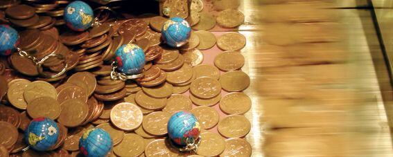 Scattered coins and globes