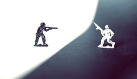 toy soldiers (Sahand Babali/Unsplash, modified by CoinDesk)