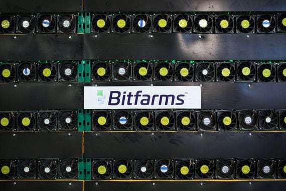 Cryptocurrency mining rigs sit on racks at a Bitfarms facility in Saint-Hyacinthe, Quebec, Canada. 
