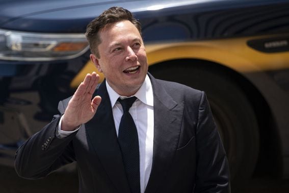Elon Musk once again tweets his support for DOGE. (Al Drago/Bloomberg via Getty Images)