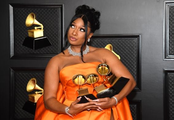 Megan Thee Stallion poses with her trophies at the 63rd Annual Grammy Awards on March 14, 2021. (Kevin Mazur/Getty Images for The Recording Academy)