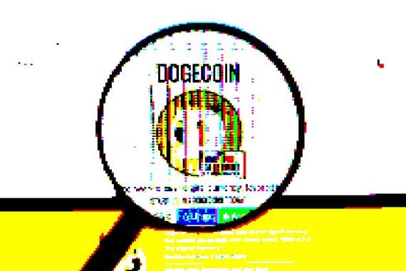 "Dogecoin-Logo am PC-Monitor, durch eine Lupe fotografiert"
