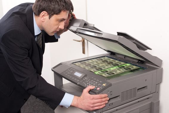 Money printer goes 'brrr'... (via Shutterstock)