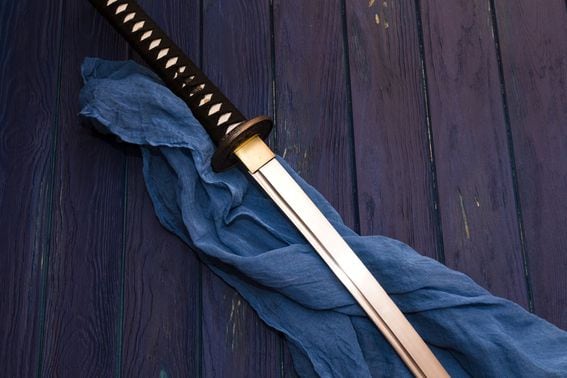 <em><a href="https://www.shutterstock.com/image-photo/japan-katana-sword-on-wood-background-548500303?src=Oe7qxiqMerVaFJApzgk7fA-1-11">Photo of katana sword</a> via Shutterstock</em>