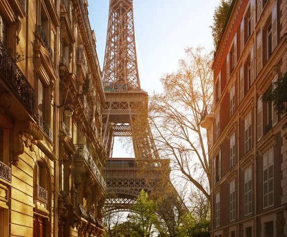 Eiffel tower between buildings