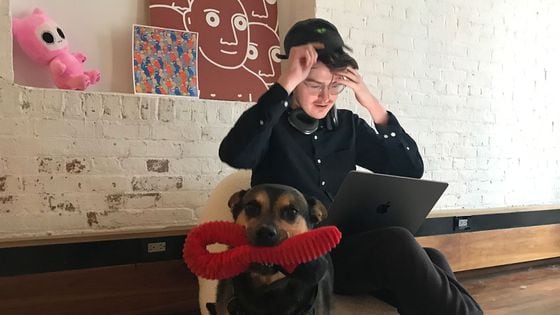 Rainbow cofounder Mike Demarais with his dog MiLady at their Brooklyn headquarters. (Daniel Kuhn/CoinDesk)