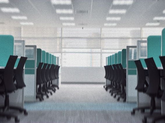 Altered photo of rows of desks (cubicles)