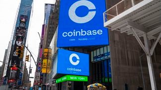 Monitors in Times Square display the Coinbase logo during the company's initial public offering. (Robert Nickelsberg/Getty Images)