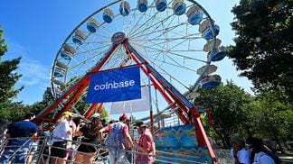 Attendees line up for the Coinbase ferris wheel during the 2021 Made In America music festival in Philadelphia. (Kevin Mazur/Getty Images for Roc Nation)