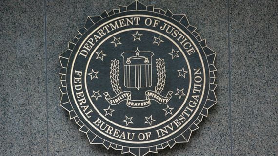 FBI symbol on side of a building.